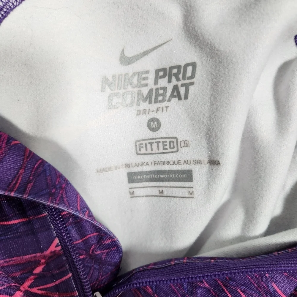 Nike pro combat purple fitted Dry-fit 1/2 zip up track jacket. Size medium